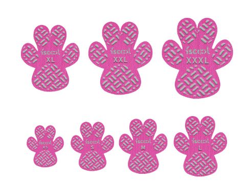 Waterproof anti-slip paw pads worn by a dog