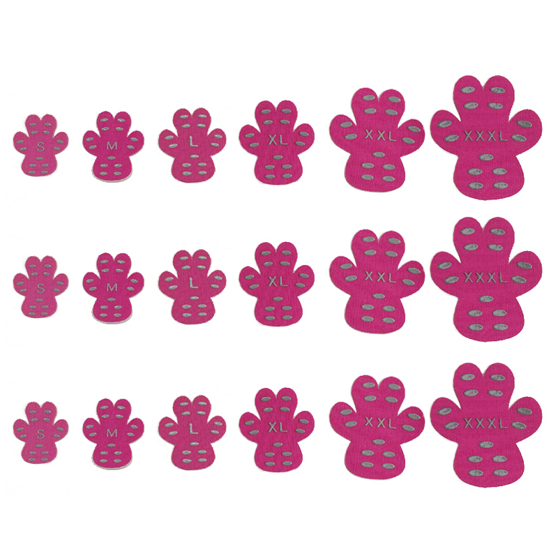 Waterproof anti-slip paw pads worn by a dog